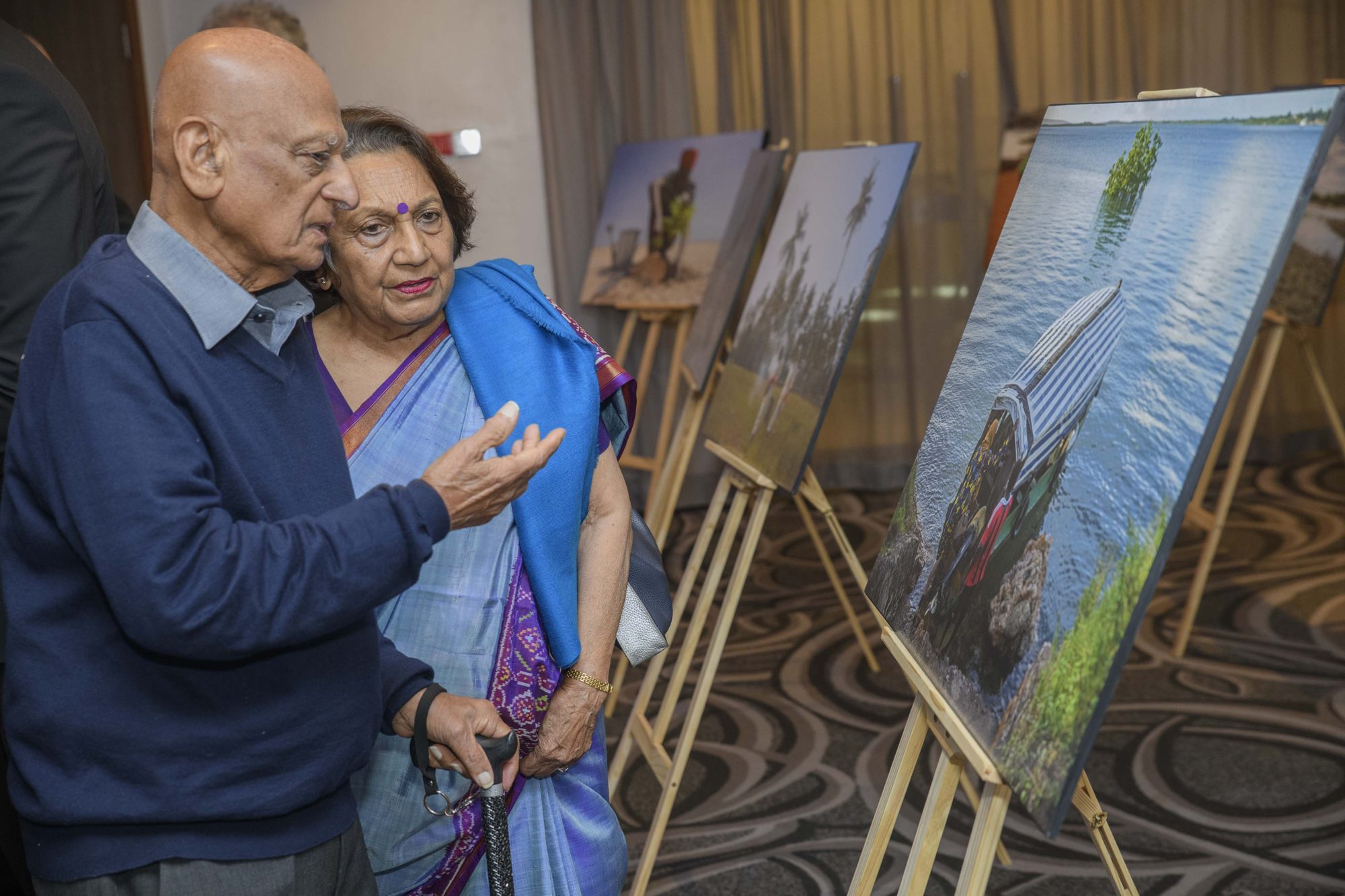 Guests studying the shortlisted frames on the exhibition floor.
